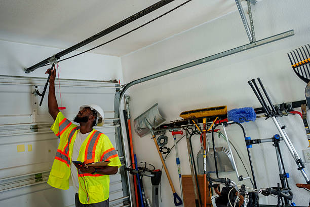 Professional Garage Door Installation technician working in Gainesville, TX